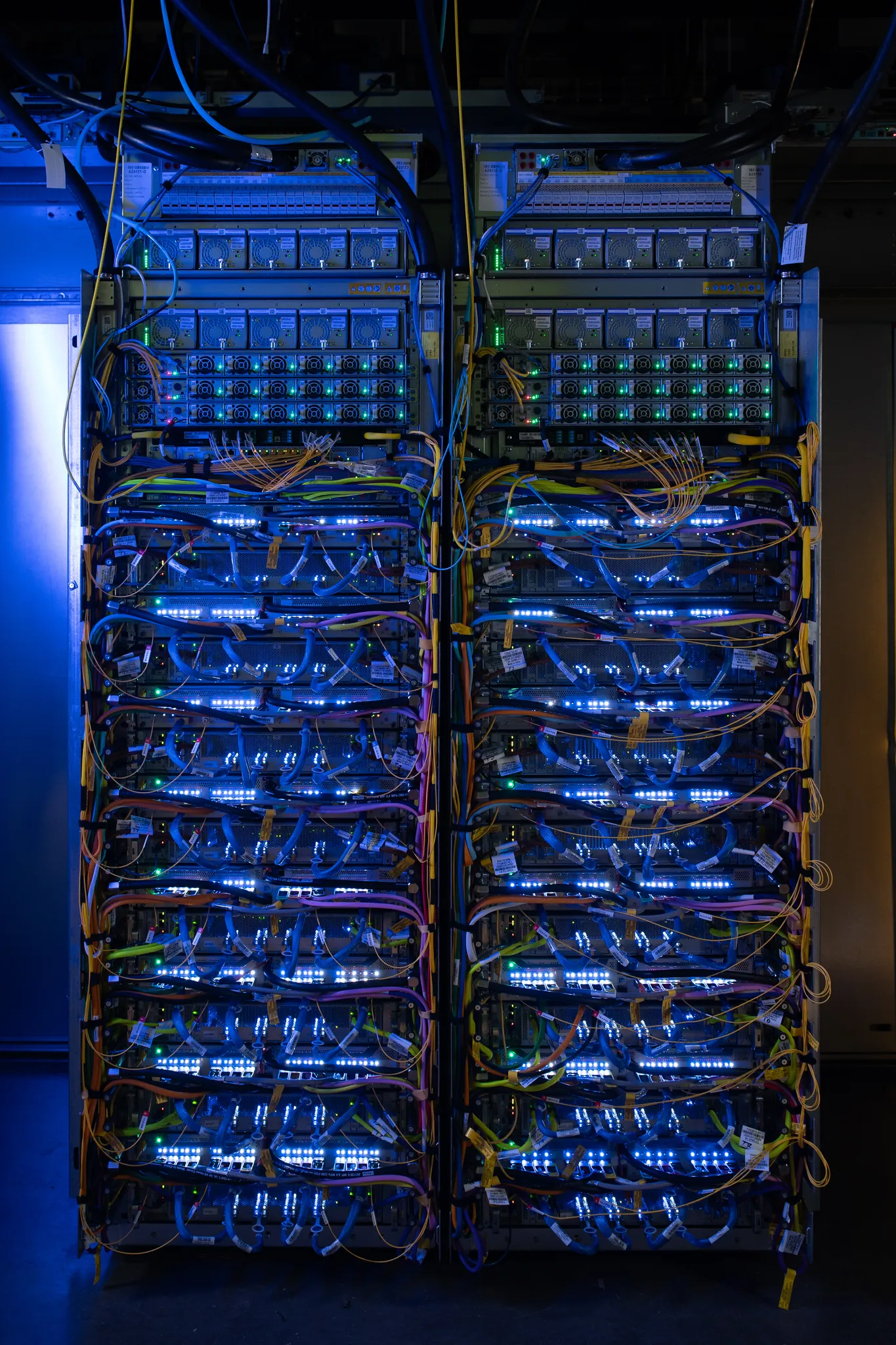 Google TPU 8i rack system in a data center aisle