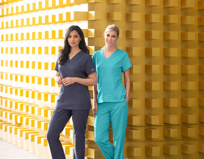 Models wearing Grey's Anatomy by Barco branded scrubs in burgundy, navy, and steel blue