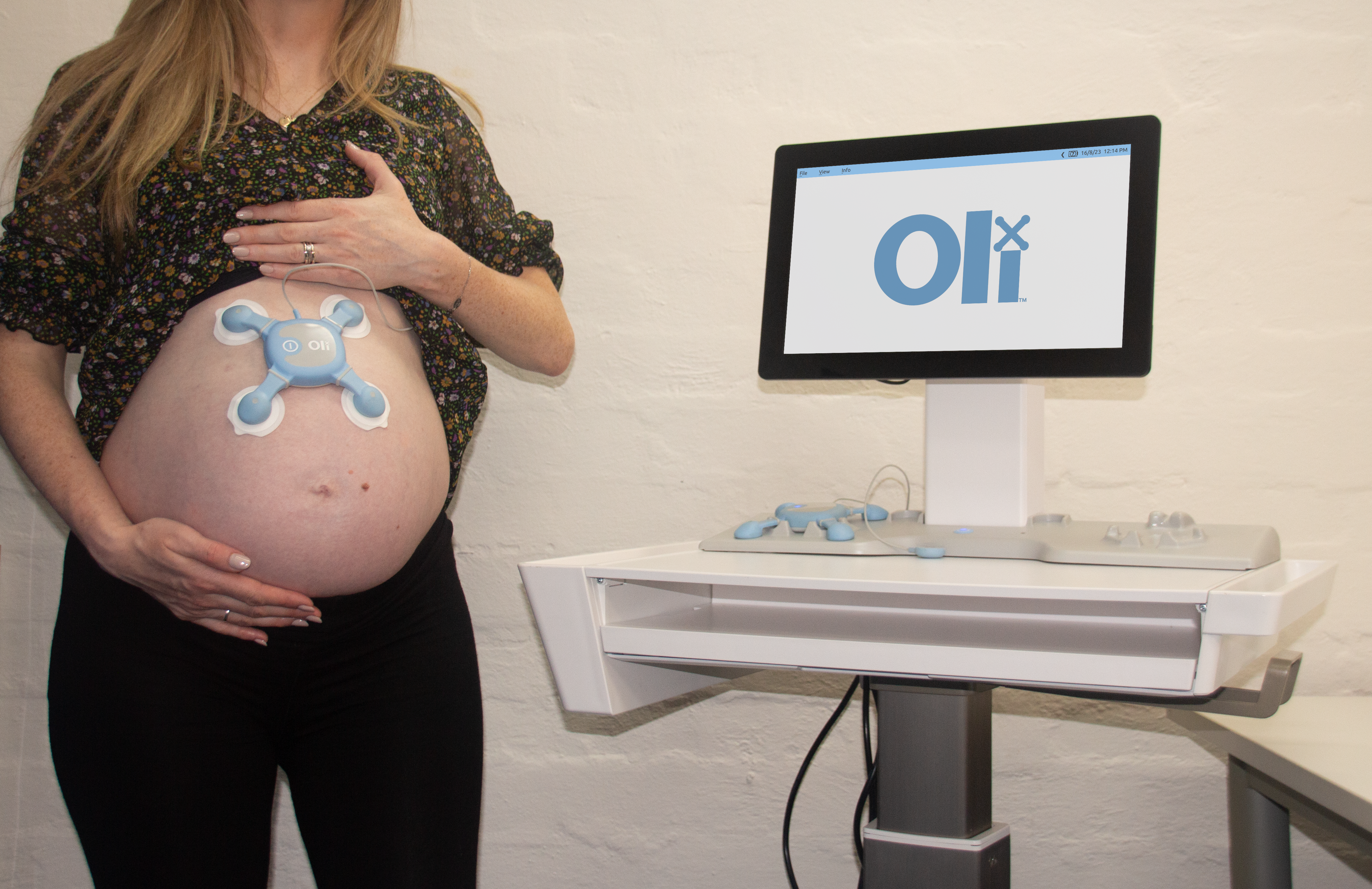 Oli wearable sensor placed on a pregnant abdomen for AI-guided electromyography monitoring
