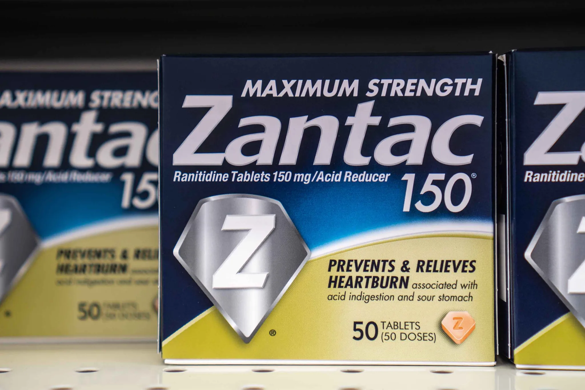 Zantac ranitidine product boxes representing the 2019 and 2020 NDMA impurity recalls and market withdrawal